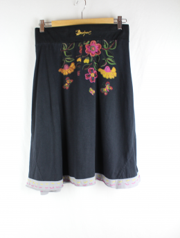 falda punto desigual