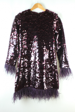 vestido lentejuelas y plumas